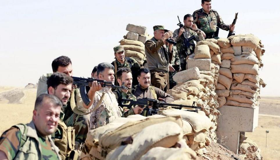 Kurdische Peschmerga-Kämpfer rüsten sich für den Angriff auf die irakische Stadt Mossul, um sie vom IS zu befreien. Bild Key