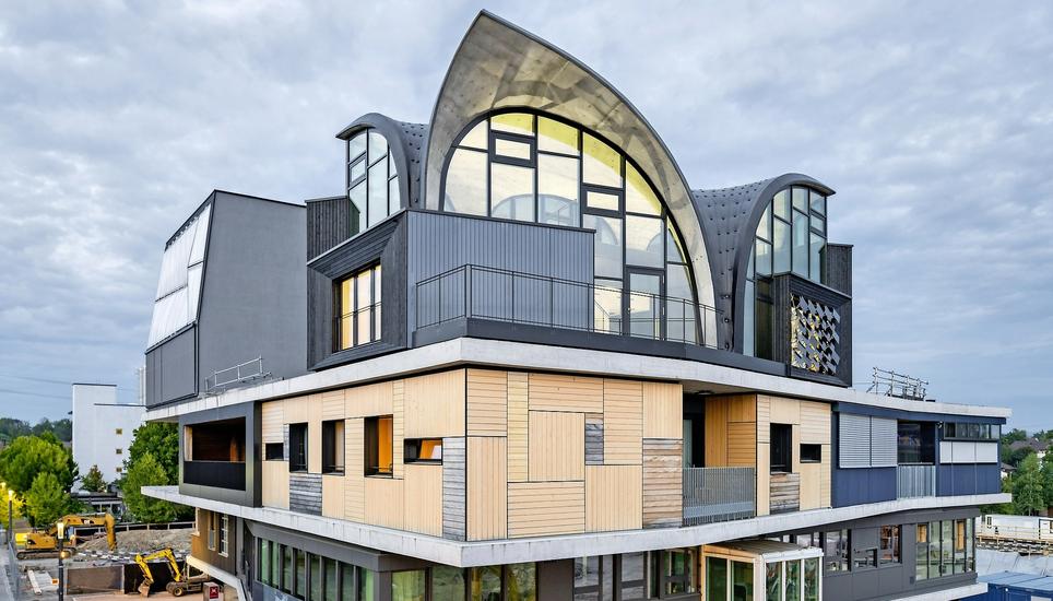 Die neu eröffnete «Nest»-Einheit «HiLo» ist ein Bau mit einem doppelt gekrümmten Dach. Bild: Empa