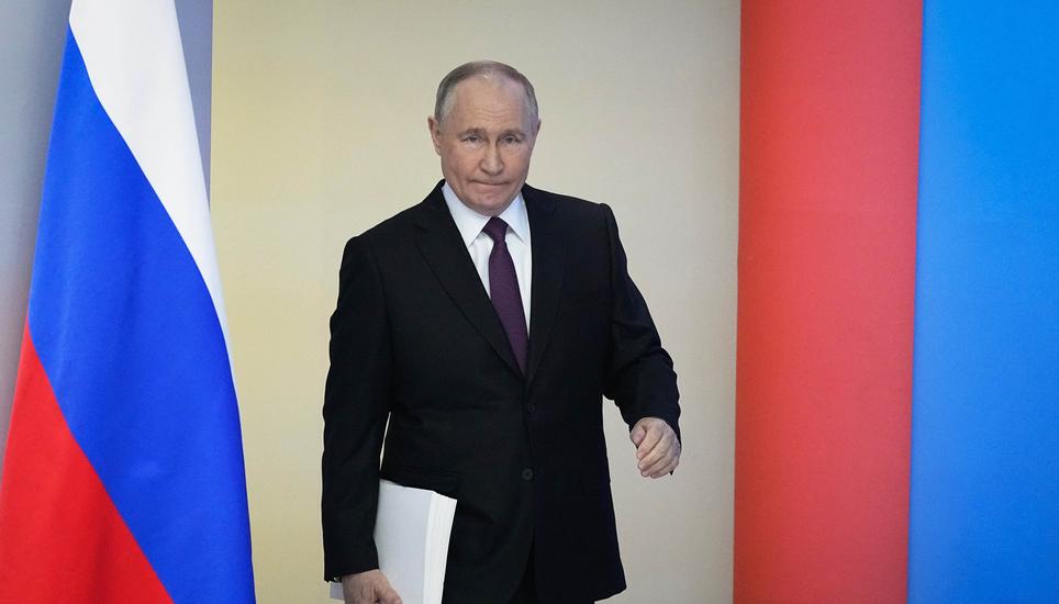 Russian President Vladimir Putin enters a hall to deliver his state-of-the-nation address in Moscow, Russia, Thursday, Feb. 29, 2024. (AP Photo/Alexander Zemlianichenko)